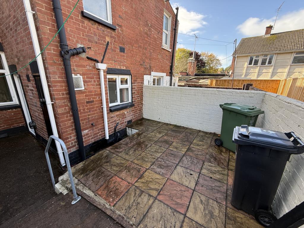 Lot: 132 - TWO-BEDROOM HOUSE FOR IMPROVEMENT - Patio Area